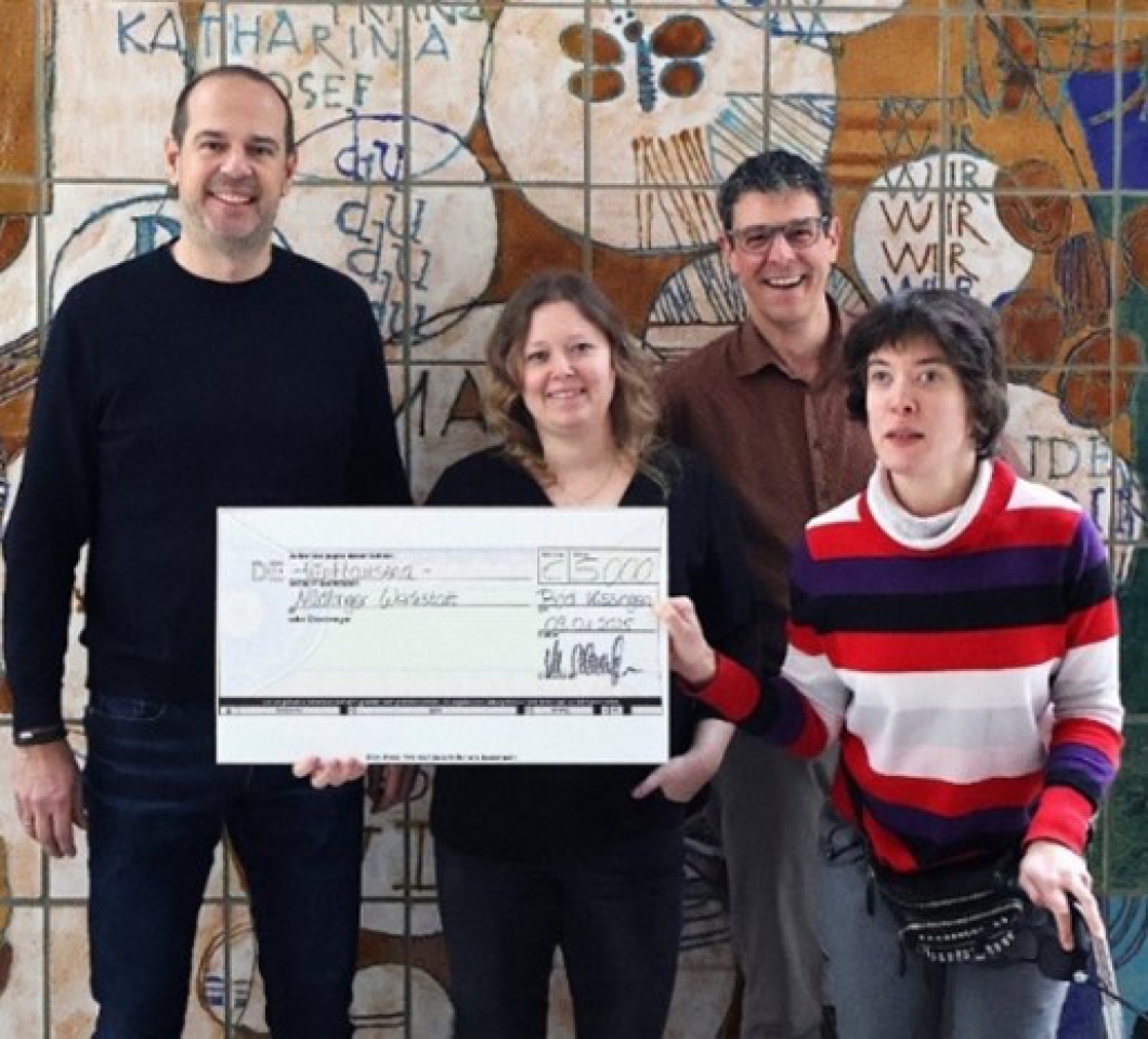 Übergabe der Spende von Pro-Care-Management an die Nüdlinger Werkstatt